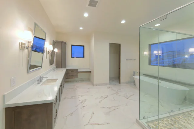 Master bathroom with dual vanity and soaking tub