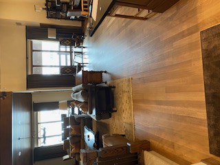 Custom railing detail above new wood flooring