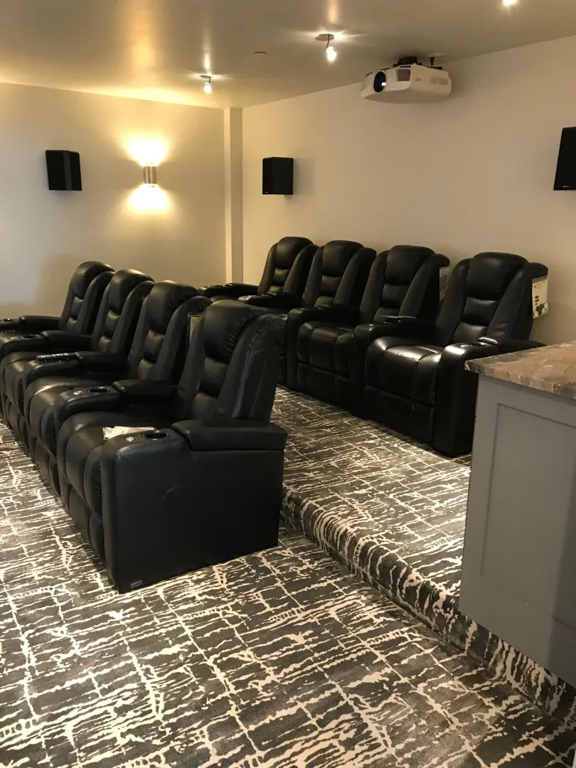 Basement home theater with tiered seating