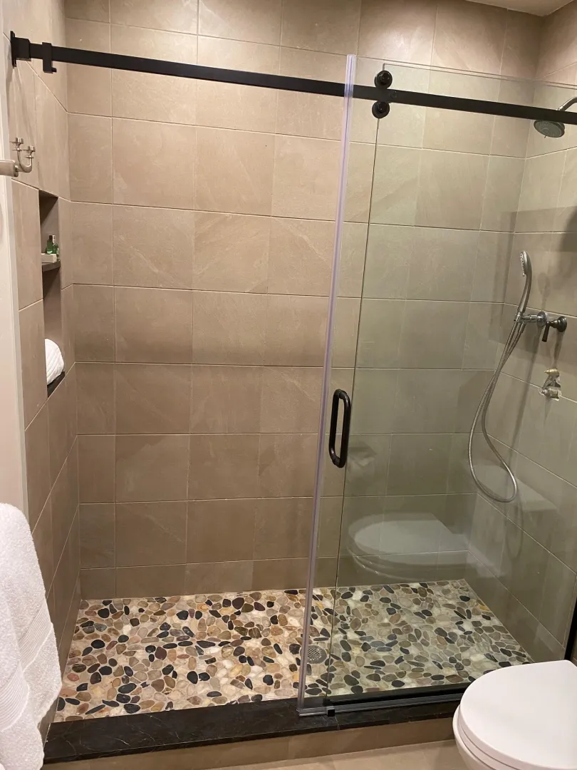Walk-in shower in a completed master-suite addition