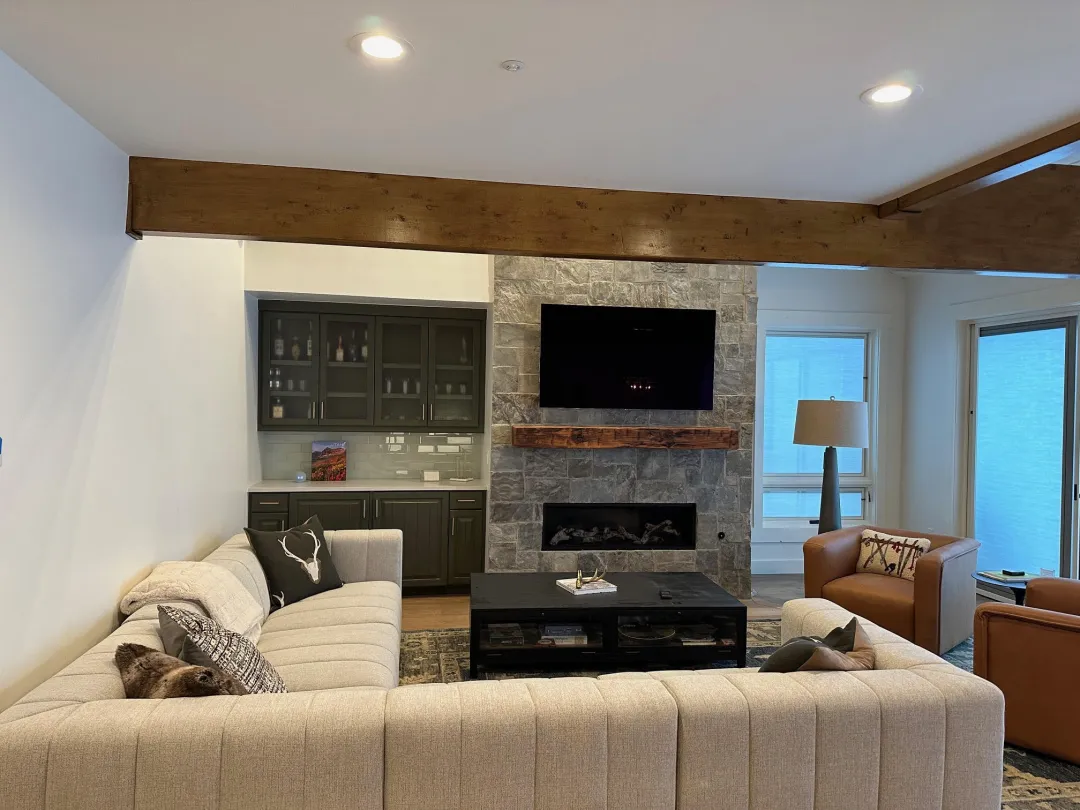 Home remodel with stone fireplace and custom wet bar in Park City Utah