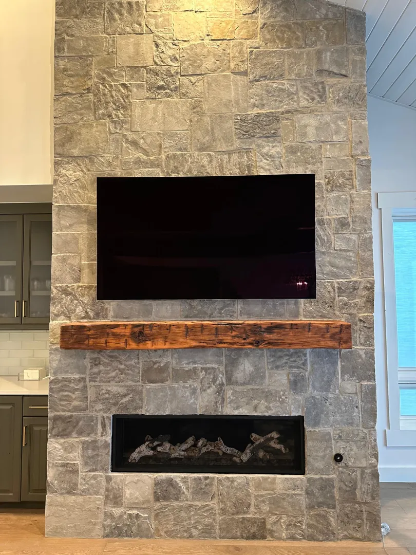 Floor-to-ceiling natural stone fireplace in Park City Utah home